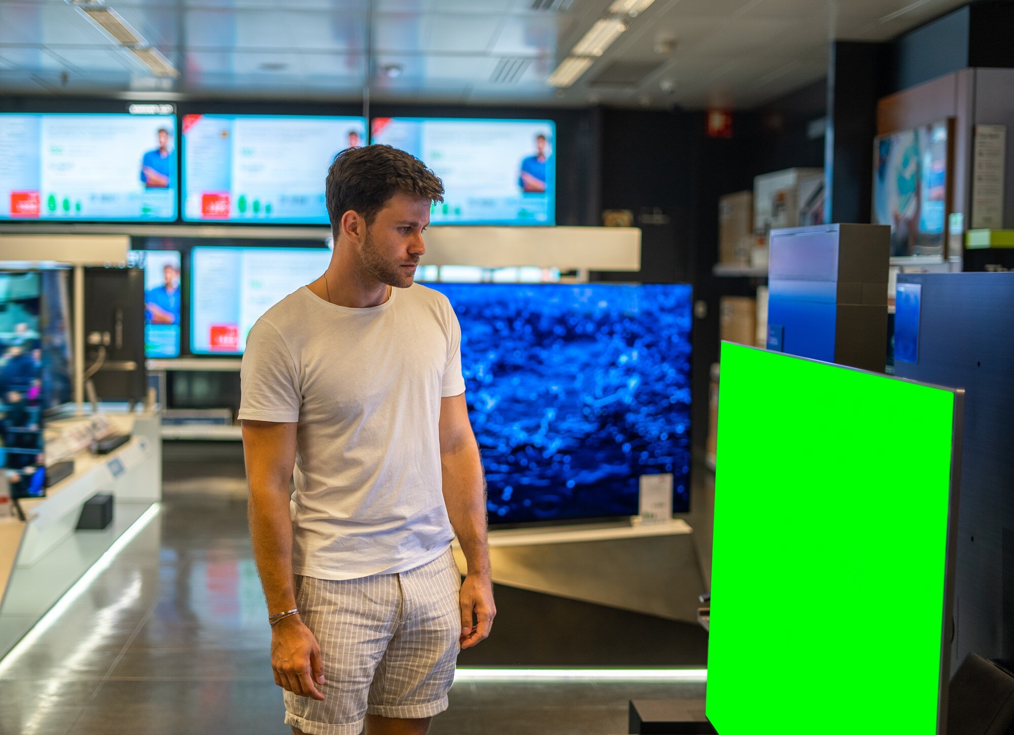 male buyer choosing television store 461973 1384