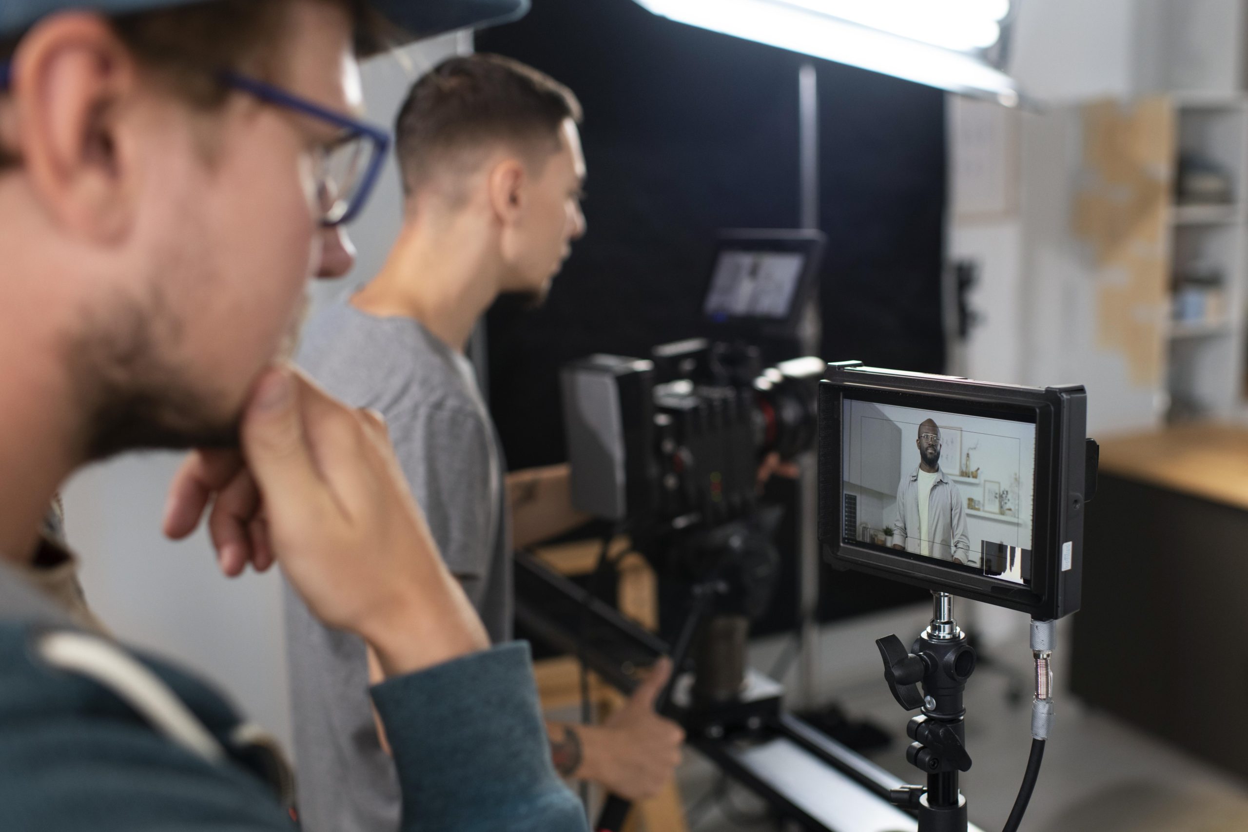 man filming with professional camera new movie scaled